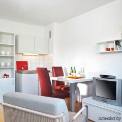 Апартаменты Frederics Serviced Apartments Мюнхен в номере