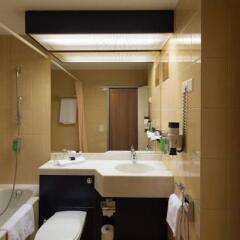 Отель Movenpick Hotel Zuerich-Airport Швейцария, Глаттбруг - 2 отзыва об отеле, цены и фото номеров - забронировать отель Movenpick Hotel Zuerich-Airport онлайн ванная фото 2
