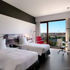 Отель Hilton Madrid Airport Мадрид комната для гостей фото 4