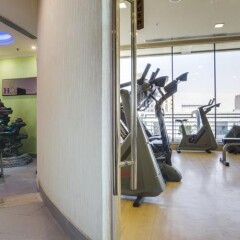Отель MENA ApartHotel Albarsha фитнесс-зал фото 4