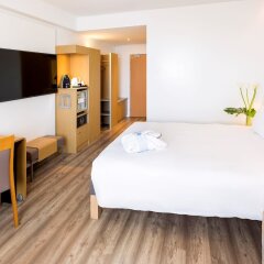 Отель Novotel Madrid Campo de las Naciones сейф в номере