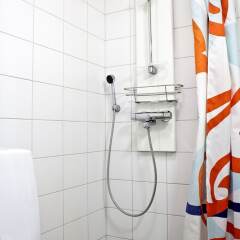 Апартаменты Forenom Serviced Apartments Helsinki Albertinkatu ванная фото 2