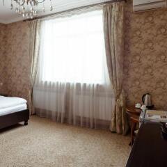 Albatros Hotel Бишкек сейф в номере