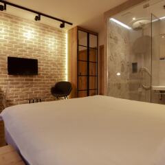 Отель Level Luxury Suites комната для гостей фото 4