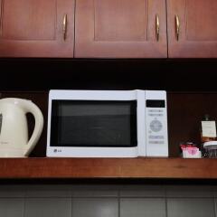 Отель Pearl City Suites удобства в номере