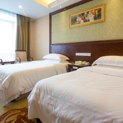 Vienna Hotel Guangzhou Shaheding Metro Station Branch комната для гостей фото 3