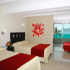 Отель Las Flores Beach Resort сейф в номере