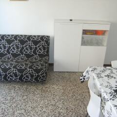 Отель Apartamentos Flomar Испания, Л’Эстартит - отзывы, цены и фото номеров - забронировать отель Apartamentos Flomar онлайн комната для гостей фото 4