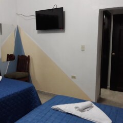 Отель Hostal Altamira Сан-Педро-Сула комната для гостей фото 3