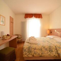 Hotel Paganella Gourmet & Relax Фай-делла-Паганелла сейф в номере
