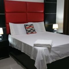 Отель Luxury Suites A Филиппины, Пампанга - отзывы, цены и фото номеров - забронировать отель Luxury Suites A онлайн комната для гостей фото 2