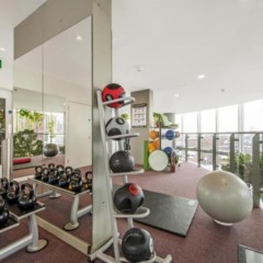Апартаменты 1 Bedroom Apartment With Gym and Terrace фитнесс-зал