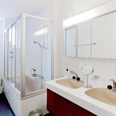 Апартаменты Comfort Apartments by Livingdowntown ванная