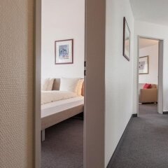 Апартаменты EMA house Serviced Apartments, Aussersihl Цюрих комната для гостей фото 4