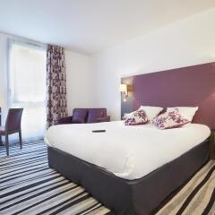 Отель Hôtel Kyriad Saint Quentin en Yvelines - Montigny Франция, Монтиньи ле Бретоне - отзывы, цены и фото номеров - забронировать отель Hôtel Kyriad Saint Quentin en Yvelines - Montigny онлайн комната для гостей фото 2