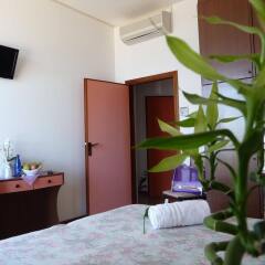 Hotel Suprem Римини комната для гостей