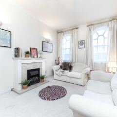 Апартаменты Spacious Apartment in Trendy Islington Лондон комната для гостей фото 4