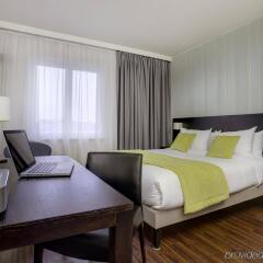 Отель Citadines Sainte-Catherine Brussels комната для гостей