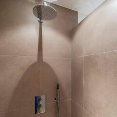 Апартаменты Tropen Apartments ванная