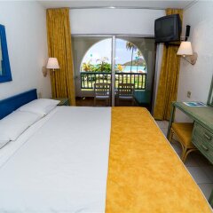 Jolly Beach Antigua - All Inclusive in St. Mary, Antigua and Barbuda from 246$, photos, reviews - zenhotels.com guestroom photo 4