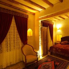 Отель Avanos Suites комната для гостей