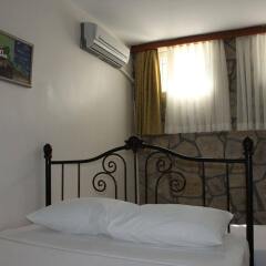 Отель Rüzgargülü Otel Бозджаада комната для гостей фото 2