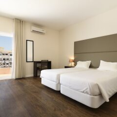 Отель Apartamentos Clube Vilarosa Португалия, Портимао - отзывы, цены и фото номеров - забронировать отель Apartamentos Clube Vilarosa онлайн комната для гостей фото 4
