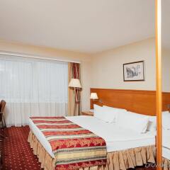 Отель Crowne Plaza Vilnius Литва, Вильнюс - 5 отзывов об отеле, цены и фото номеров - забронировать отель Crowne Plaza Vilnius онлайн комната для гостей фото 4