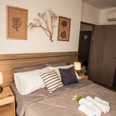Отель Treetops Pattaya Condominium Паттайя комната для гостей фото 4