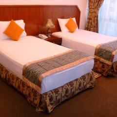 Al Zahabiya Hotel Apartments комната для гостей