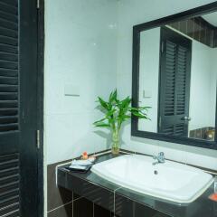 Отель Golden Tulip Essential Pattaya ванная фото 2