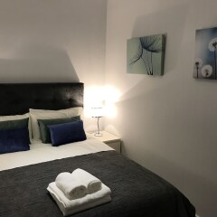 Апартаменты Stay at Home Madrid Apartments IV комната для гостей фото 3