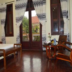 Отель Orchids Homestay комната для гостей фото 3