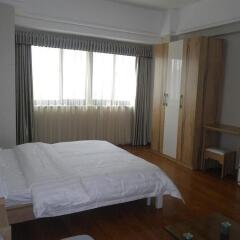 Апартаменты Daily Home Inns Self-service Apartment Сямынь комната для гостей