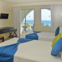 Отель Aquamarina Beach Resort Мексика, Канкун - отзывы, цены и фото номеров - забронировать отель Aquamarina Beach Resort онлайн комната для гостей фото 3
