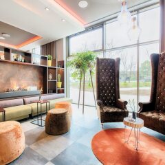 Отель Leonardo Royal Hotel Amsterdam Нидерланды, Амстердам - отзывы, цены и фото номеров - забронировать отель Leonardo Royal Hotel Amsterdam онлайн интерьер отеля фото 2