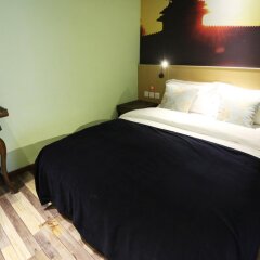 Отель Beijing Yoyo Hotel Nanluo Guxiang Branch Китай, Пекин - отзывы, цены и фото номеров - забронировать отель Beijing Yoyo Hotel Nanluo Guxiang Branch онлайн комната для гостей фото 5