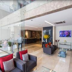 The Luxe Hotel интерьер отеля фото 3
