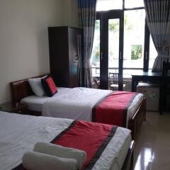 Отель Vip Garden Homestay Хойан комната для гостей