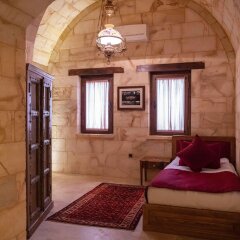 Отель Kayakapi Premium Caves Cappadocia комната для гостей фото 4