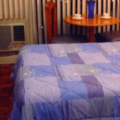 Отель Citadel Inn Makati Филиппины, Макати - отзывы, цены и фото номеров - забронировать отель Citadel Inn Makati онлайн комната для гостей