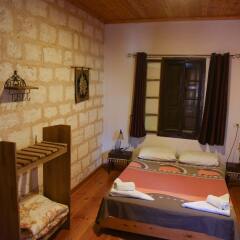 Fauzi Azar by Abraham Hostels Израиль, Назарет - отзывы, цены и фото номеров - забронировать отель Fauzi Azar by Abraham Hostels онлайн комната для гостей фото 3