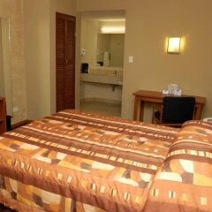 American Inn Hotel & Suites Delicias комната для гостей фото 2