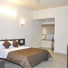 Отель Jypore Saffron Inn & Suites комната для гостей фото 5