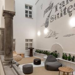 Отель 7 Tales Suites интерьер отеля