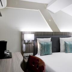 Отель Le Phénix Hôtel Франция, Лион - отзывы, цены и фото номеров - забронировать отель Le Phénix Hôtel онлайн комната для гостей фото 2