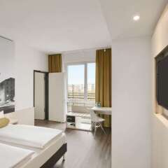 Отель Super 8 Munich City West комната для гостей