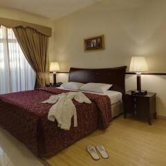 Отель Tulip Inn Al Qusais Dubai Suites ОАЭ, Дубай - отзывы, цены и фото номеров - забронировать отель Tulip Inn Al Qusais Dubai Suites онлайн комната для гостей