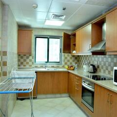 Legacy Hotel Apartments в номере