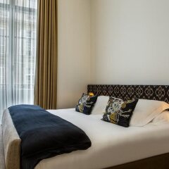 Hotel Marignan Champs-Elysées комната для гостей фото 5